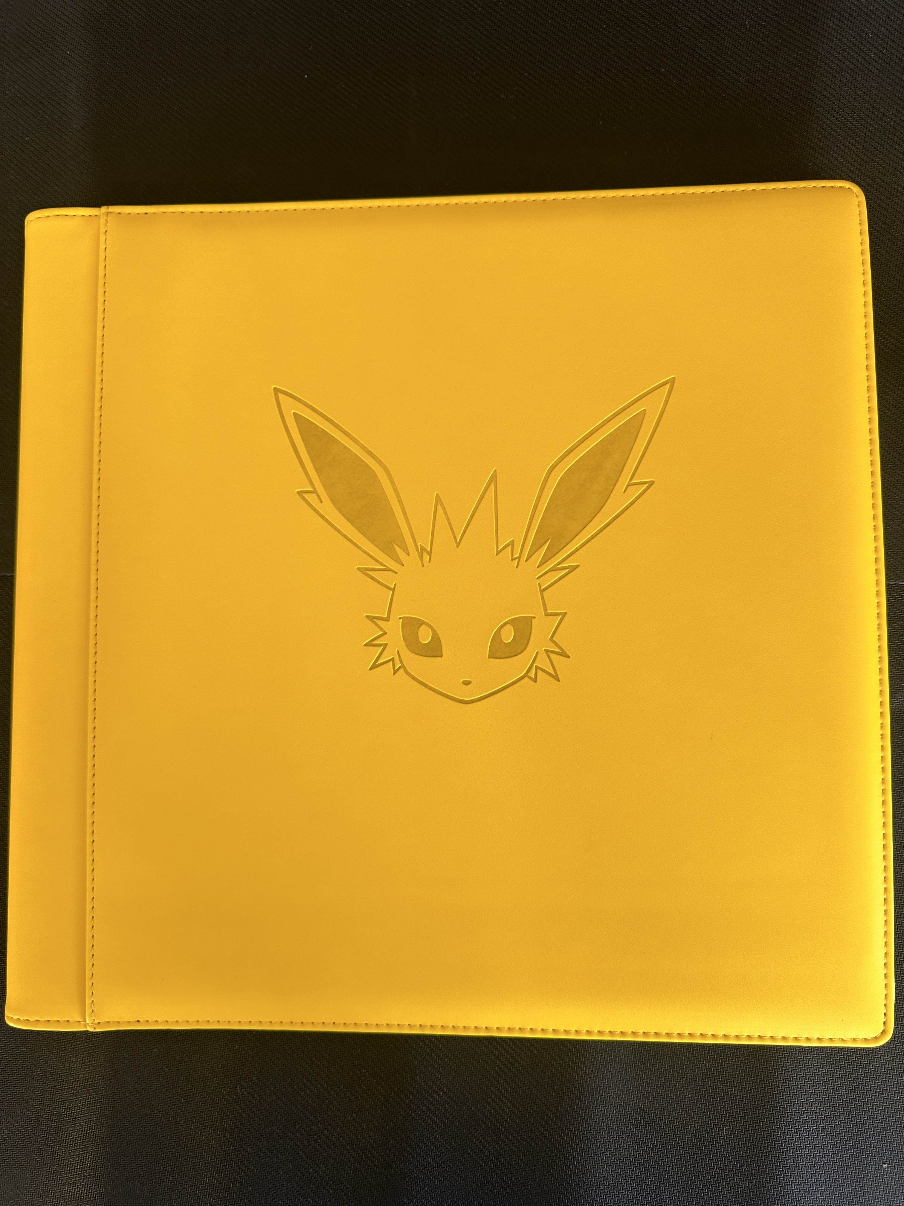 jolteon card binder Jolteon Binder (Accessories) – PokePort Cards